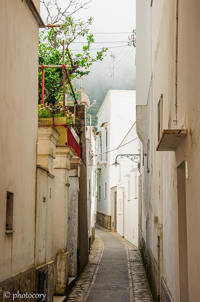 Narrow street and scary clouds