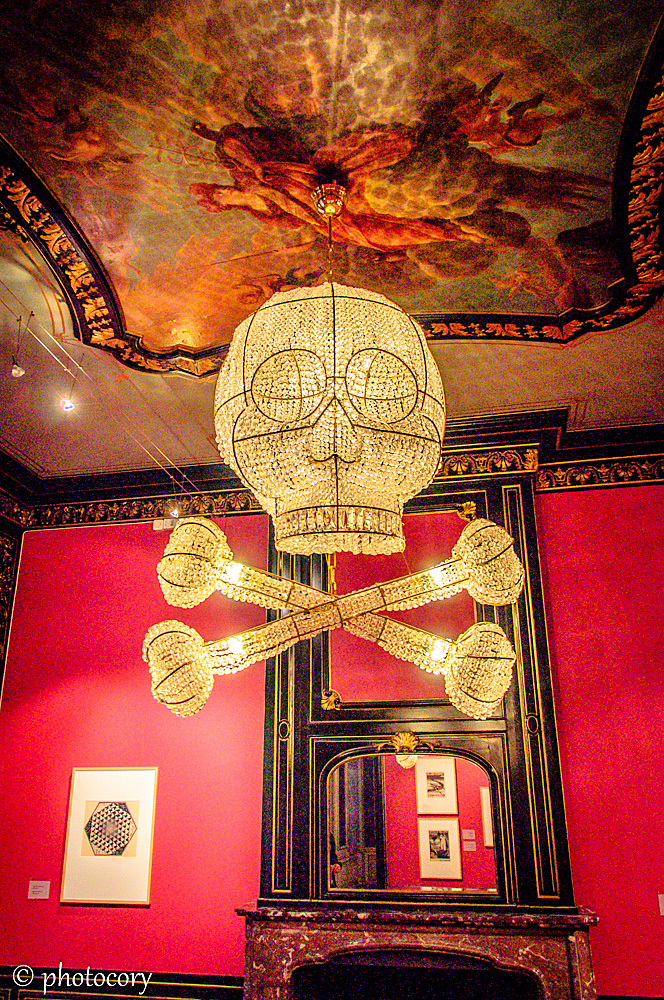 Skeleton chandelier in Escher museum