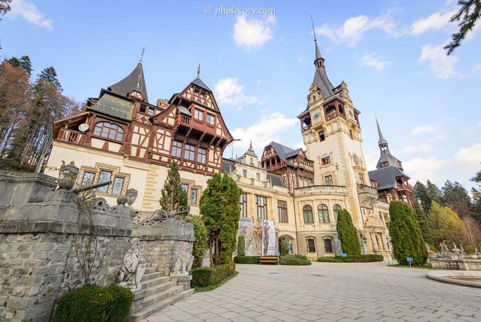 Stone lions on the stairs of Peles Castle