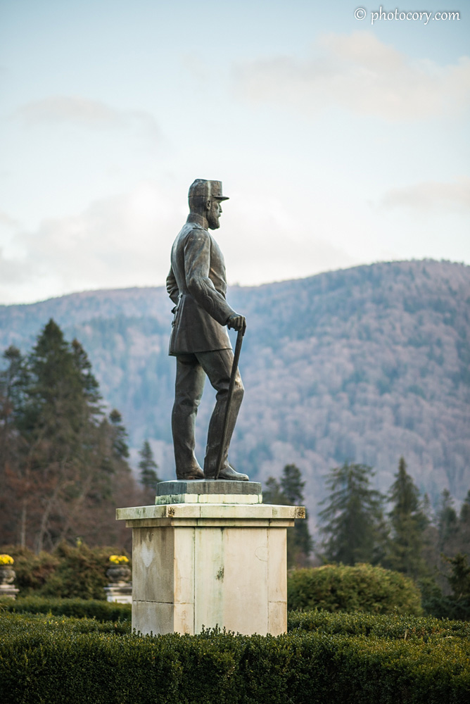 The Statue of Carol I of Romania is guarding the Peles Castle