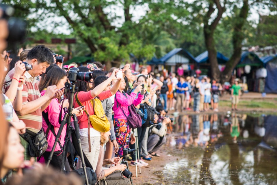 people at sunrise angkor wat