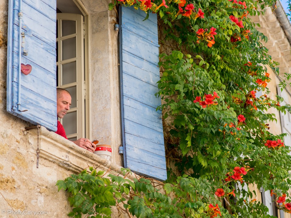 Lourmarin man at window