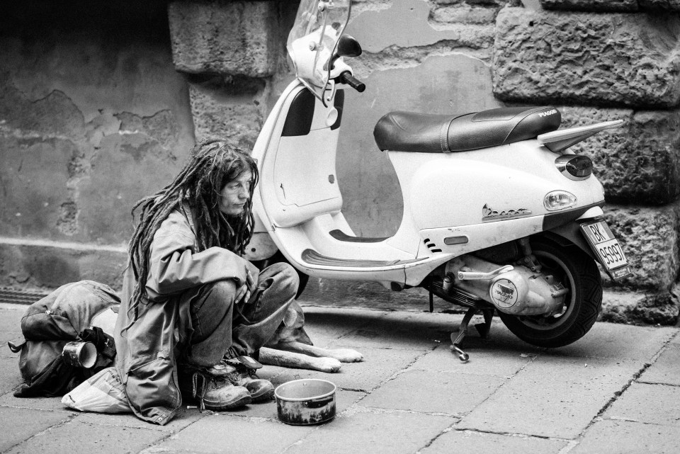 beggar and his dog