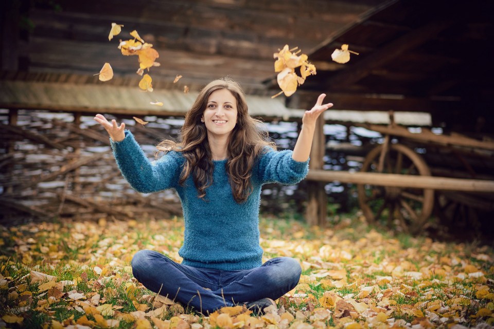 throwing leaves autumn
