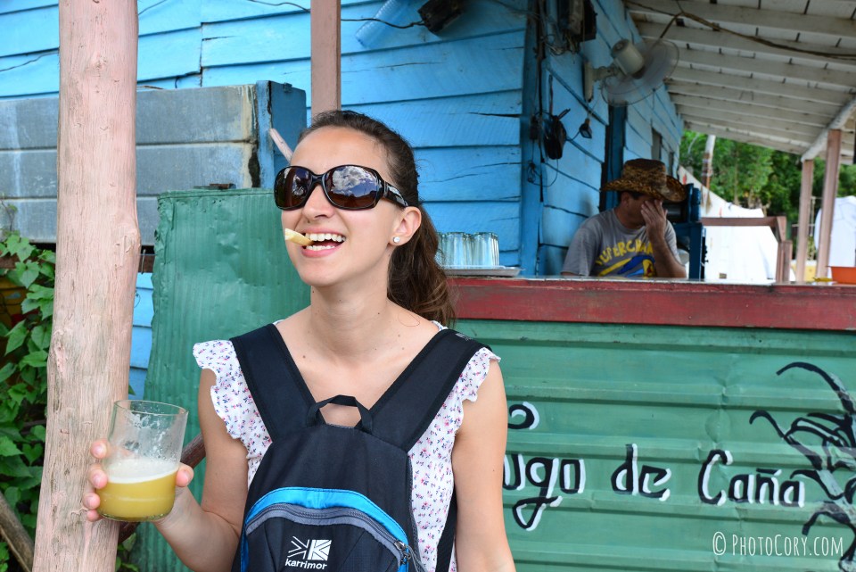 drinking sugarcane juice