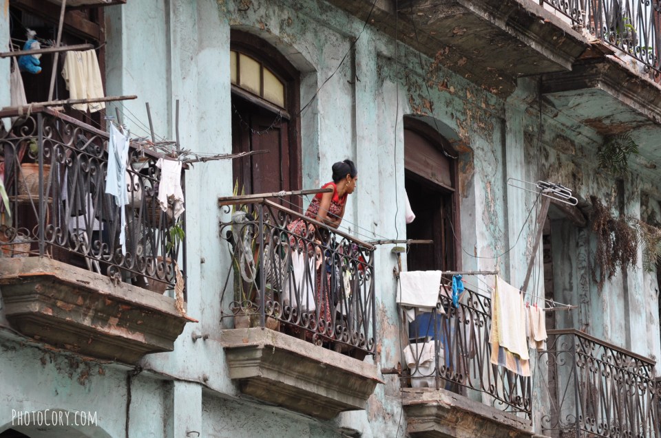 people balcony havana