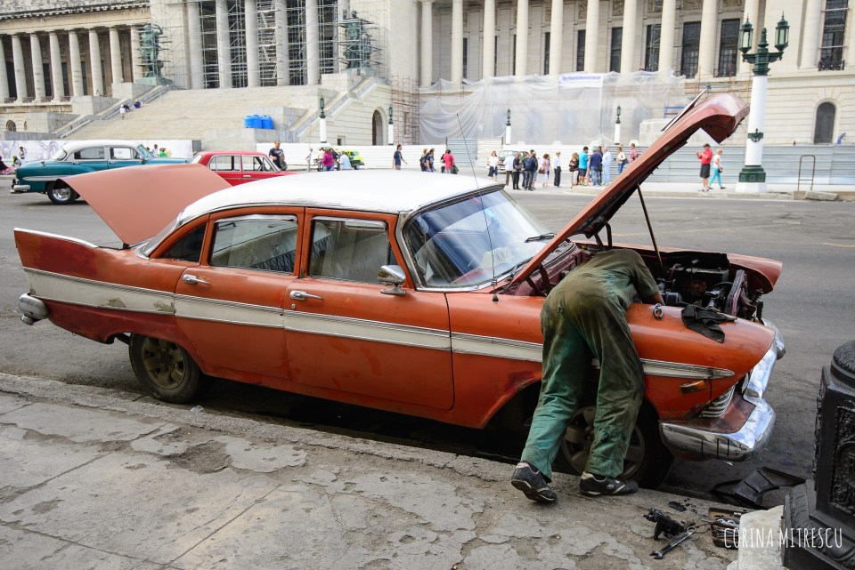 repairing old car in havana